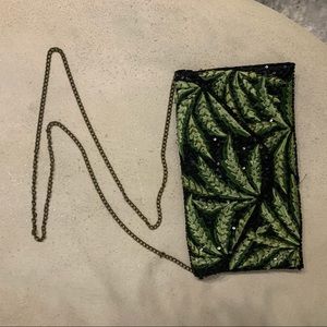 Palm leaf sequin clutch evening bag